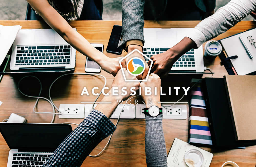 5 fists in with accessibility.works logo overlay