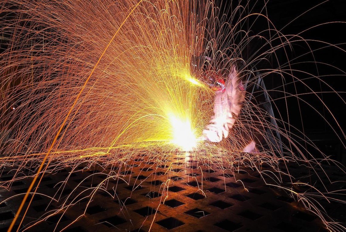 welder with sparks flying - metaphor for ADA website remediation